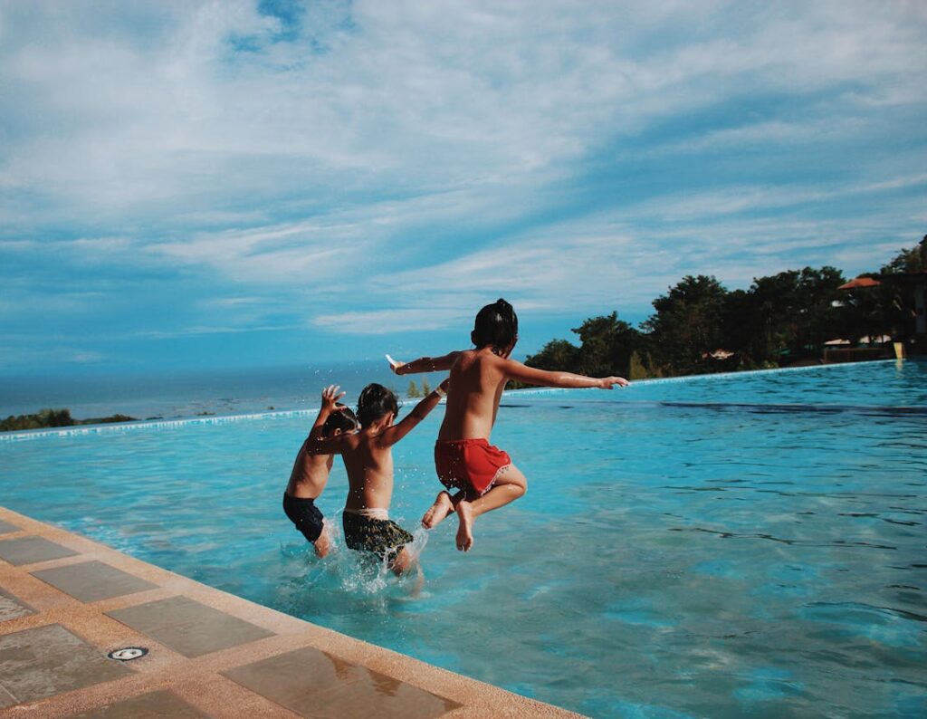 Three Boy's Jumping Into the Water